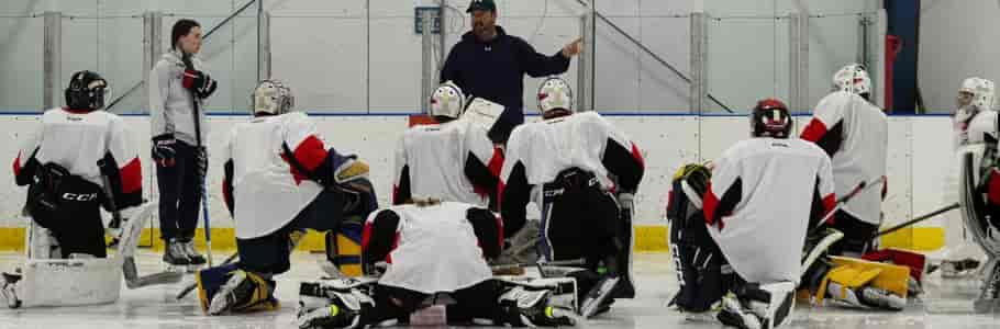 Group of goalies listening to instructions from JS